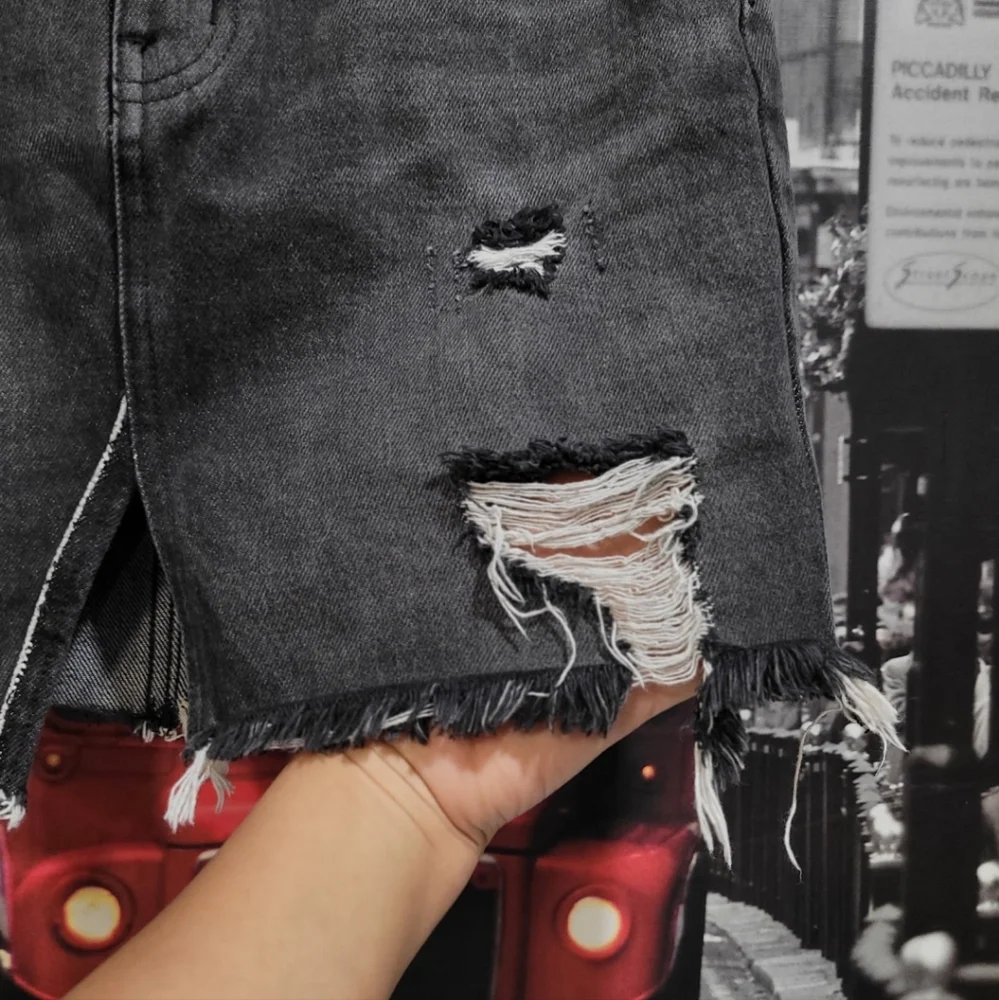 We The Free Distressed Washout Black Denim Mini Skirt